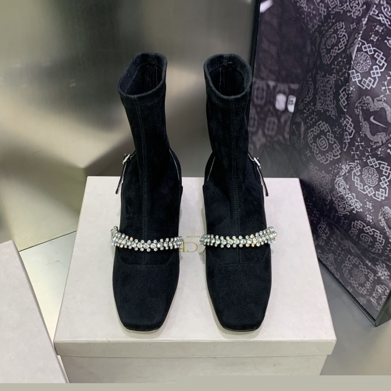 Ji*y Ch* boots